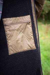 Green/Black Colourway Small Zipped Pocket with Headphone Holes